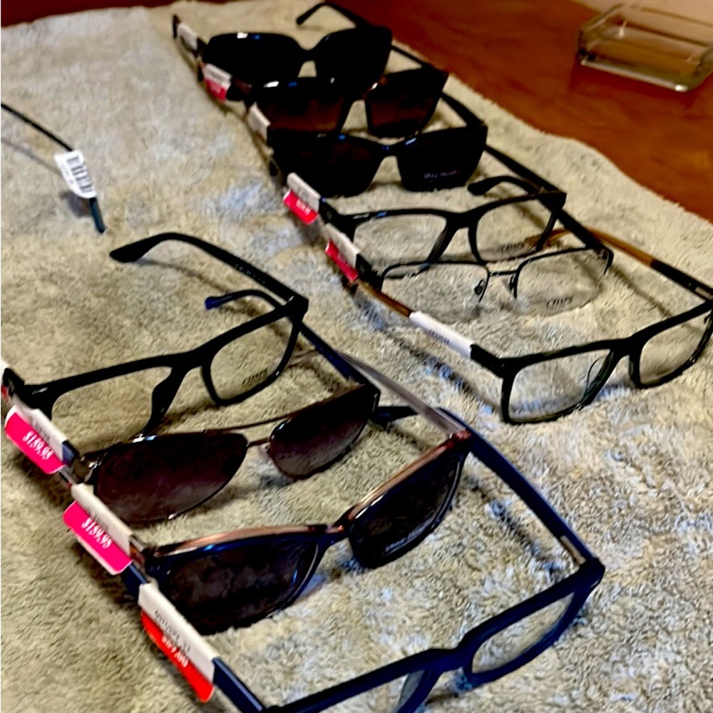 Men’s and women’s name brand glasses  .  Calvin Kline, Vera Bradley, camps.